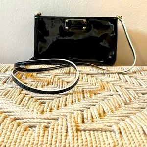 Authentic small black patent leather Kate Spade purse. 9.5W x 5.5H